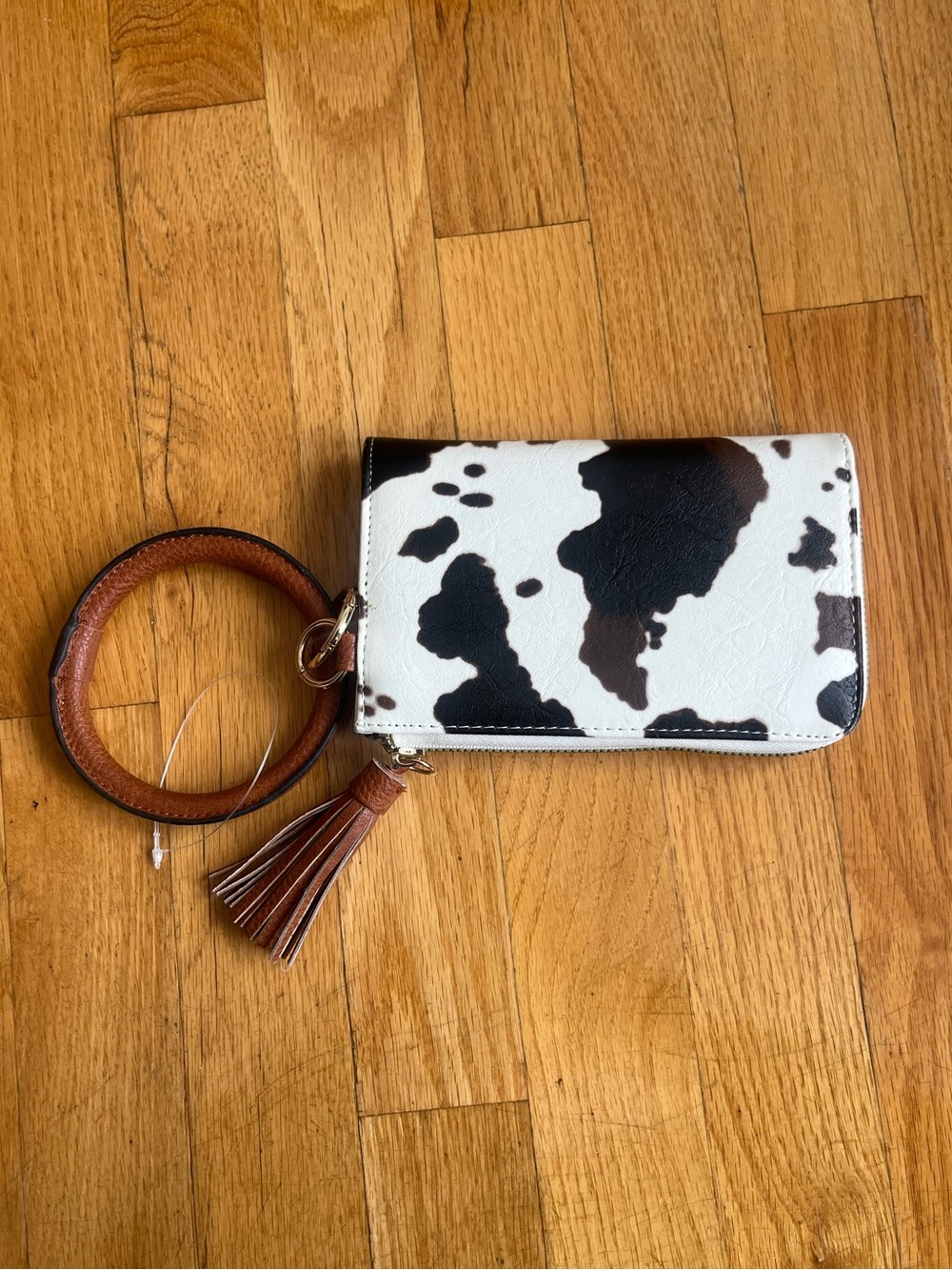 Free w/ purchase! NWOT Cow print wristlet / clutch / wallet